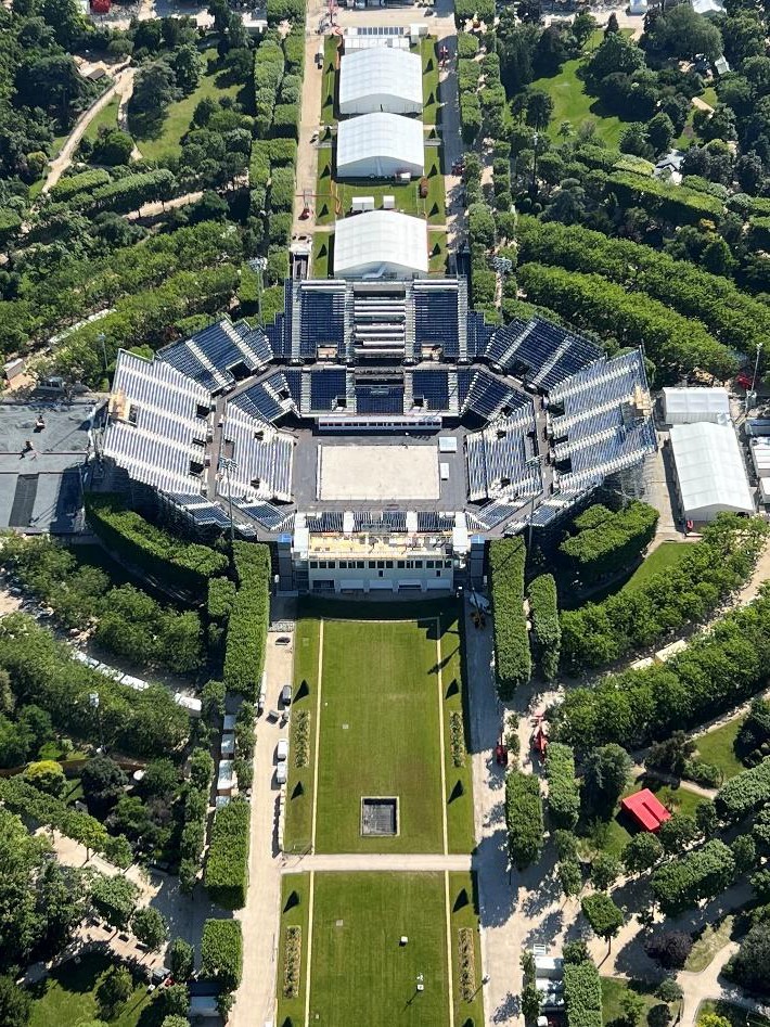 the Olympic Beach Volleyball Stadium, built just below the Eiffel Tower as its backdrop as seen from the top of the Eiffel Tower 